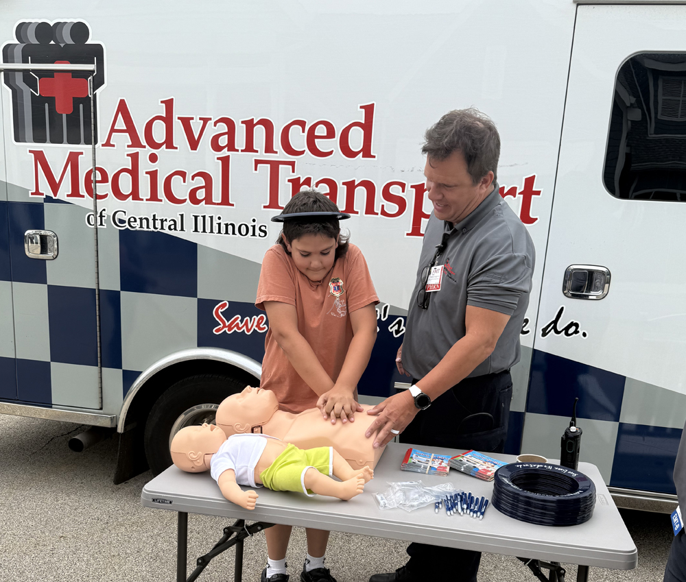 outside table display showing hands only cpr